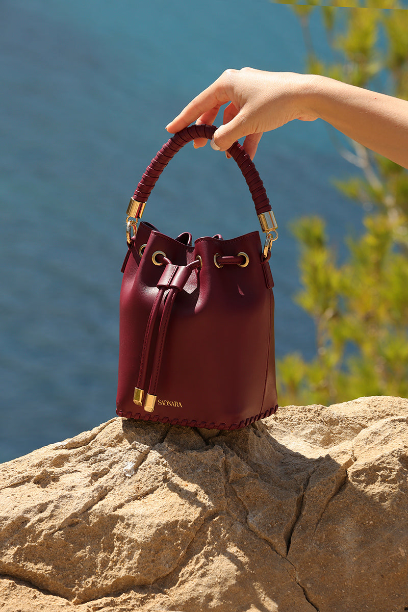SAONARA MINI BUCKET BERRY PIEL