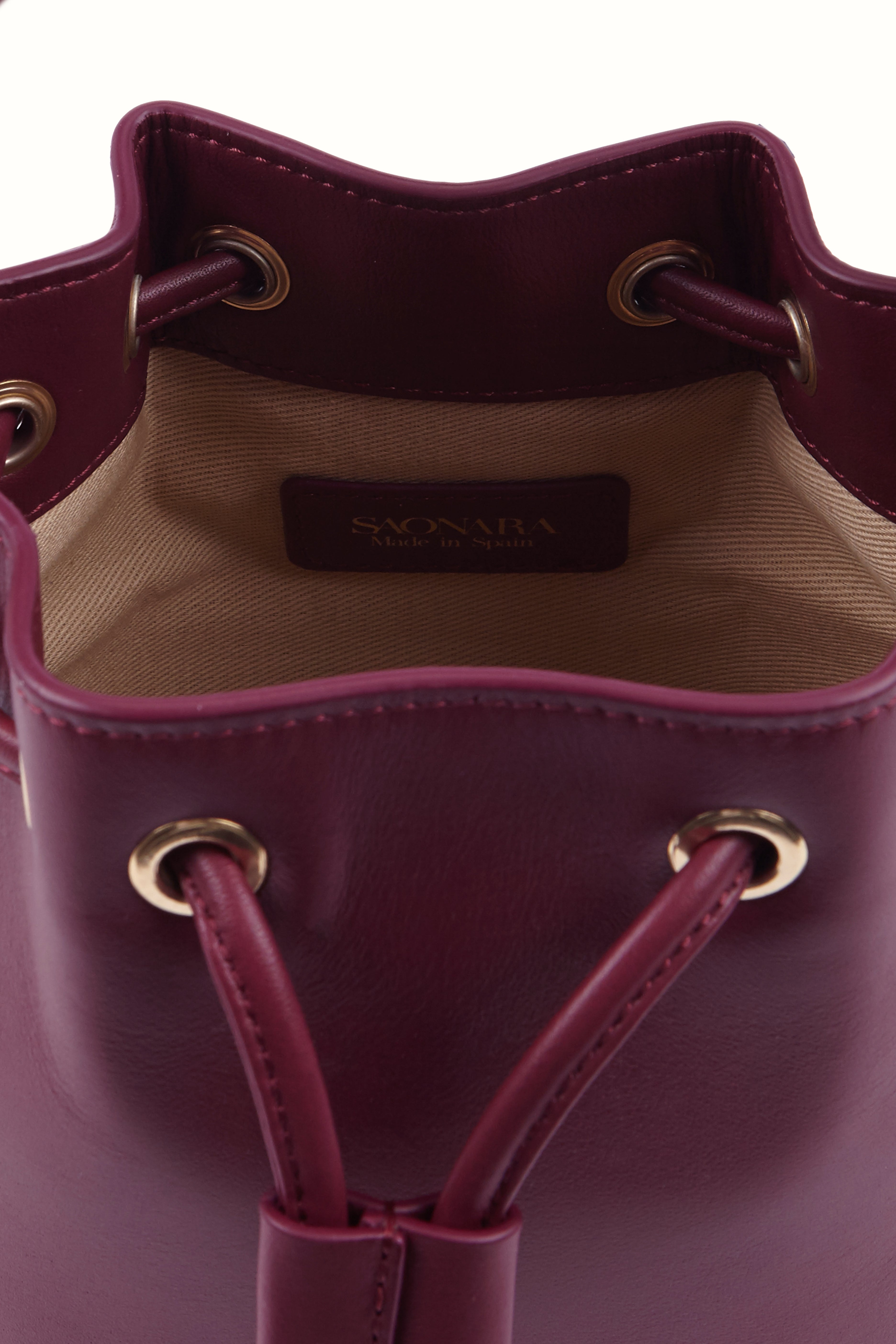 SAONARA MINI BUCKET BERRY PIEL